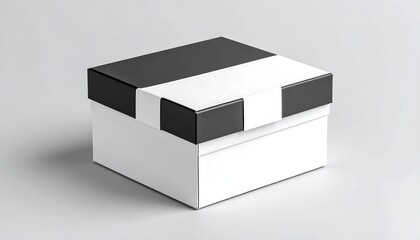 Naklejka premium Minimalist Black and White Gift Box with Ribbon on Neutral Background