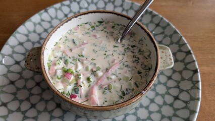 Enjoy a Delicious and Creamy Soup made with Fresh Herbs and Colorful Vegetables Today