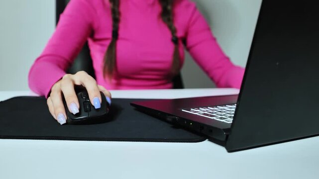 Remote work lifestyle in home office showing minimal design, focused female user