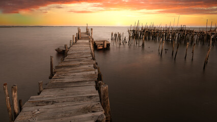 Old fishing pier - Carrasqueira Comporta Palafítico Pier - The Carrasqueira Comporta Palafítico Pier is a place known as an architectural masterpiece. Travel concept.