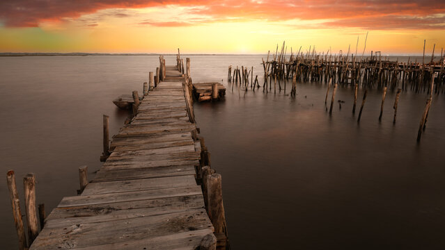 Old fishing pier - Carrasqueira Comporta Palaf&iacute;tico Pier - The Carrasqueira Comporta Palaf&iacute;tico Pier is a place known as an architectural masterpiece. Travel concept.