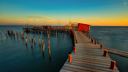 sunset on the old fishing pier