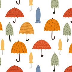 Seamless pattern with different hand drawn autumn umbrellas. Open umbrellas, rainy seasons. Autumn seamless pattern for wallpaper, background, paper, wrapping, packaging