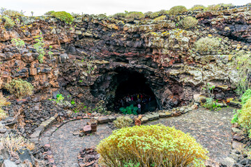 Cueva de los Verdes – Illuminated volcanic lava tube on the Canary Island of Lanzarote with a perfect reflection in a natural lagoon
