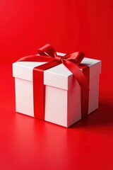 Obraz premium Empty white gift box, red ribbon, red background Perfect for holiday mockups , marketing, holiday, space