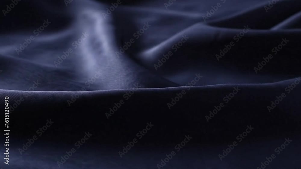 Poster dark blue satin fabric with folds creating a smooth undulating surface
