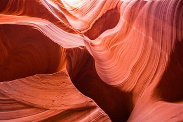This image showcases the stunning natural formations of Antelope Canyon, where the erosion of...