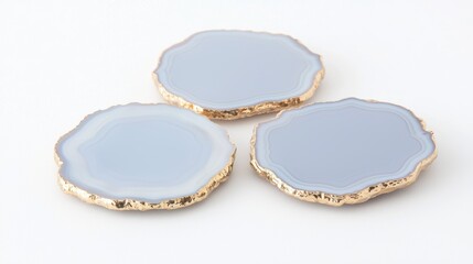 Elegant Blue Geode Coasters with Gold Trim on White Background