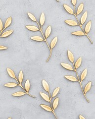Elegant Golden Leaves Pattern on Gray Concrete Background for Modern Design Aesthetics