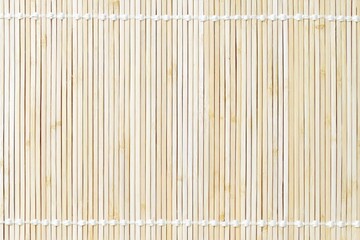 Close-up of light beige woven bamboo mat