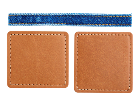 Two tan leather patches with stitching detail alongside a blue denim strip.