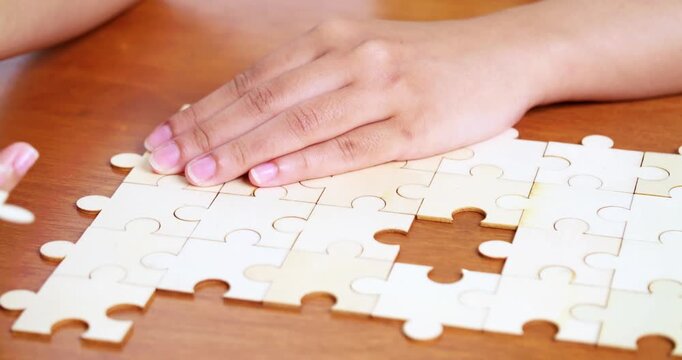 Engage a relaxing puzzle assembly session at home focusing creativity and problem-solving.