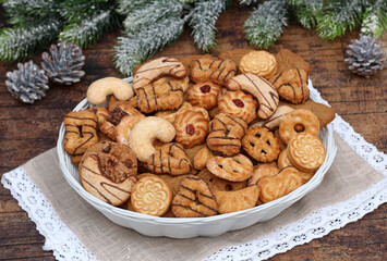 A plate of Christmas cookies and tea biscuits.