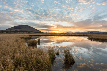 Early morning sunrise reflections in Yellowstone