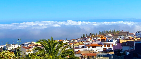 View from above on Vilaflor mountain village located in highlands of southern Tenerife, Canary islands, Spain.Travel concept banner for design.