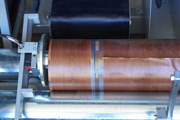 Textured Lamination Material Feed with Guided Roller Clamp System