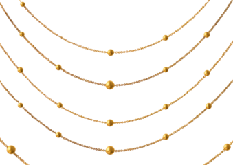 Gold chains with decorative beads, layered in a necklace pattern against a black background