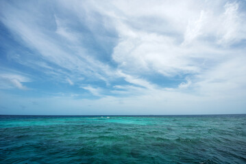 Seascape horizon where ocean meets sky, offering a serene natural backdrop perfect for your creative projects