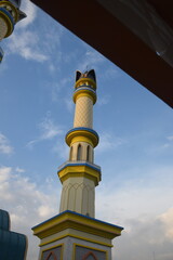 The magnificent architecture of the Grand Mosque in Mataram City, Lombok Island, Indonesia, against a blue sky