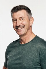 Fototapeta premium Smiling senior man in studio: A friendly and approachable senior man smiles warmly at the camera. He is in a studio. and showing contentment. 