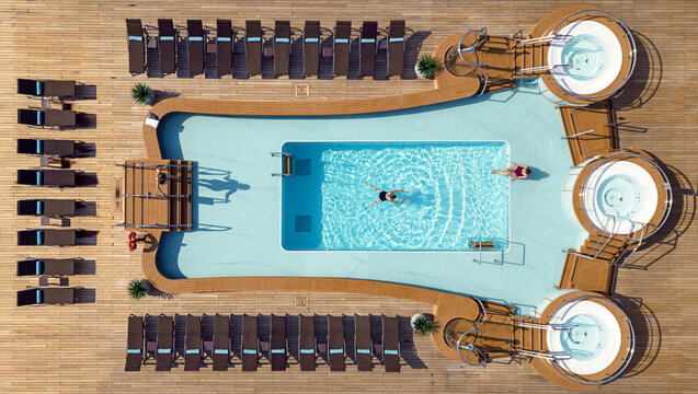 Aerial view of the swimming pool and jacuzzi on the deck of a cruise ship reflecting the bright sky, Split, Split-Dalmatia County, Croatia.