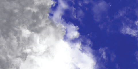 Artistic sky background with fluffy clouds in various shades of grey white and blue ideal for digital designs
