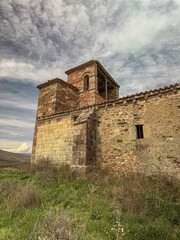 Stone bell tower of San Martin Church in Rabanal de los Caballeros countryside