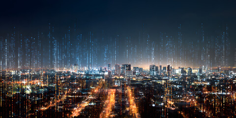 Obraz premium High Tech Cityscape at Night with Bright Lights and Digital Data Streams.