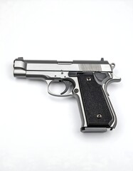 A metallic handgun on a white background