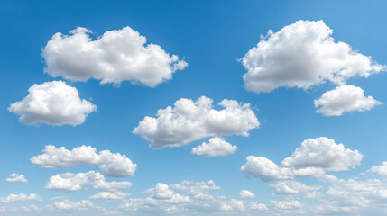 Obraz premium Fluffy white clouds drift across clear blue sky, creating serene and peaceful atmosphere