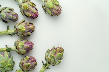 Vibrant Fresh Artichokes on White with Ample Copy Space for Healthy Food Concepts
