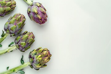 Vibrant Fresh Artichokes with Stems on Clean White Background with Ample Copy Space