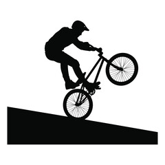 Fototapeta premium Vector silhouette of a BMX rider performing a wheelie trick on a ramp. Freestyle bicycle motocross athlete doing an extreme stunt.