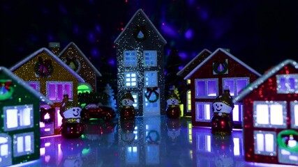 Decorated Christmas town with colorful houses and snowmen