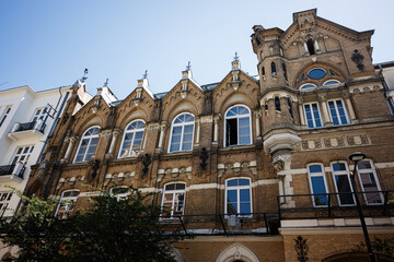 Elegant historic building with elaborate brick facade and gothic architectural details