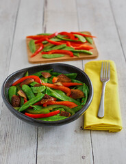 snow peas sautéed with red bell pepper and mushrooms