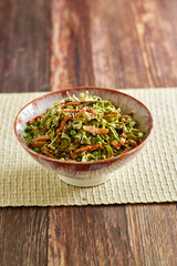 spinach flavored egg noodles with smoked ham and green peas