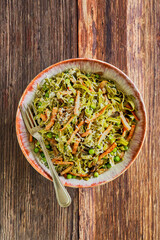 spinach flavored egg noodles with smoked ham and green peas