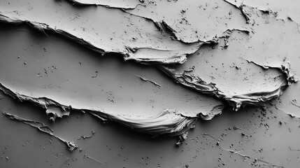 Abstract black and white textured background with thick uneven strokes of paint or plaster emphasizing rough surfaces gritty tactile feel and expressive monochrome abstract art design