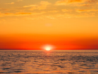 Fototapeta premium Sunlight Giving Orange Color To The Sunset Sky 