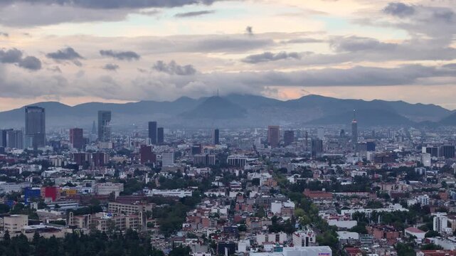shot of mexico city downtown during sunset on a cloudy day