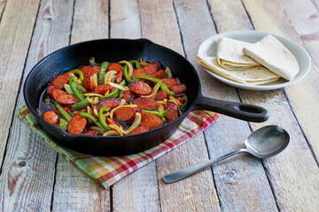 sweet and spicy sausage fajita mix with onion and green bell peppers