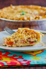 tomato pie made with a parmesan cream sauce