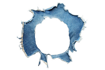 Close up of a ripped denim fabric with frayed edges isolated on transparent background