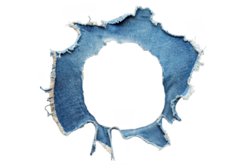 Close up of a ripped denim fabric with frayed edges isolated on transparent background