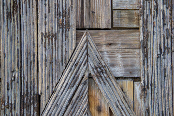 Old wooden background, close-up. Texture of an old wooden door.