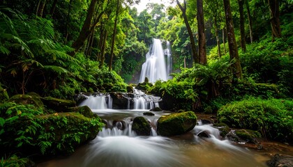Majestic waterfall cascading through a vibrant, lush green forest landscape, creating a serene and