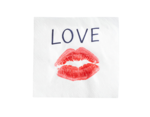 A white napkin with the word "LOVE" written above a red lipstick kiss imprint.