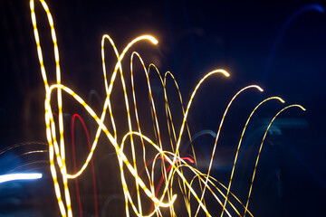 light trails on the street in the city at night. long exposure