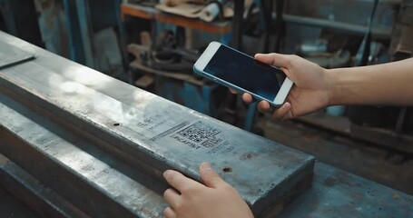 Scanning qr code metal beam - Powered by Adobe